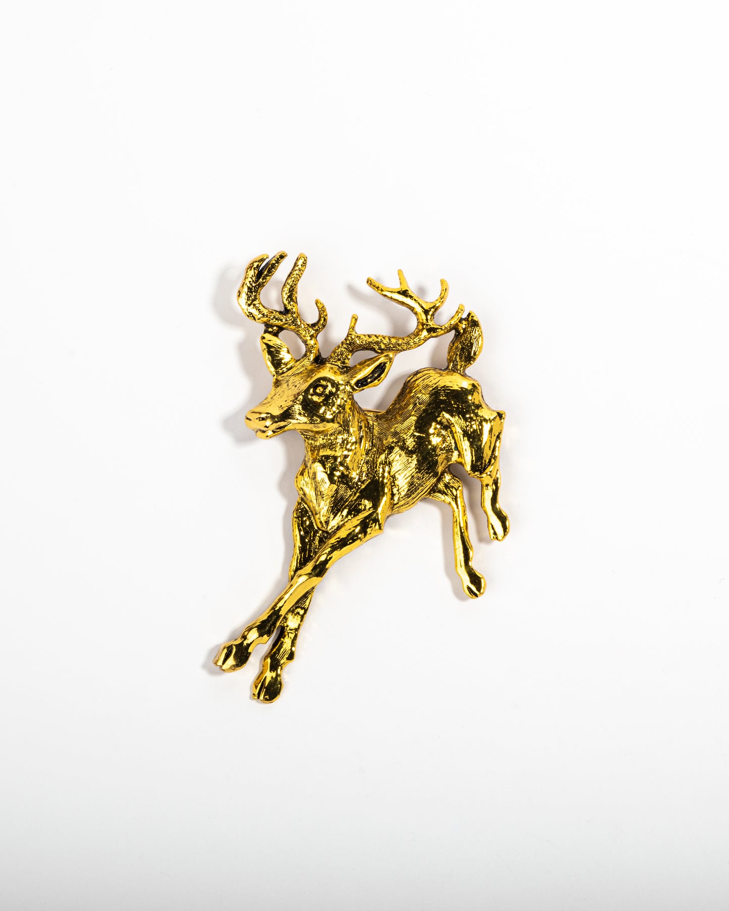 The golden gazelle brooch