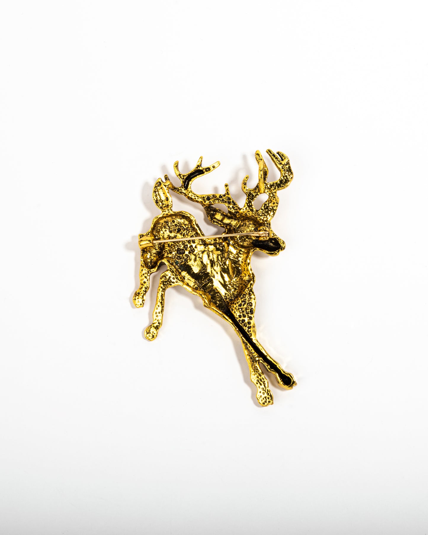 The golden gazelle brooch
