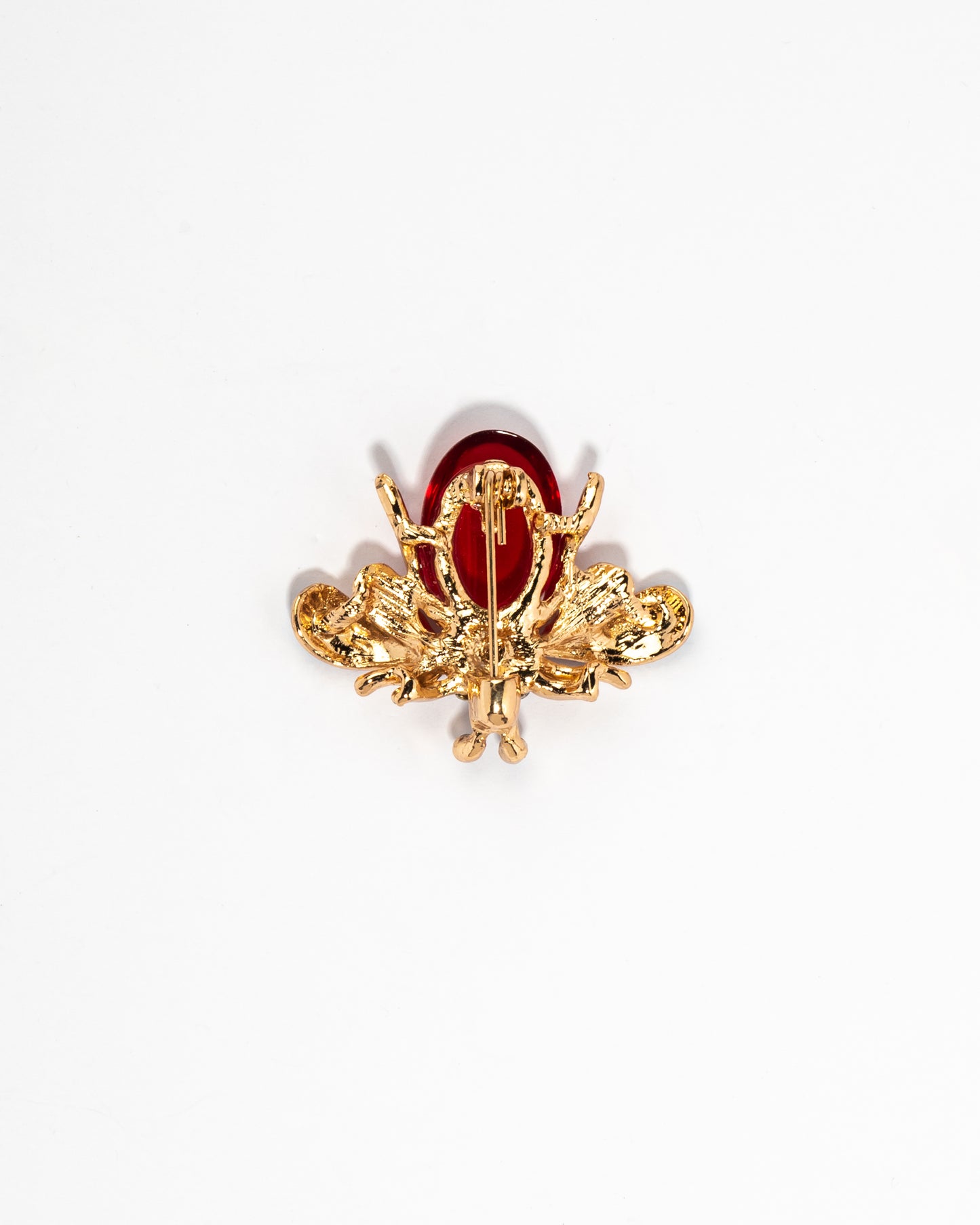 Crimson critter brooch